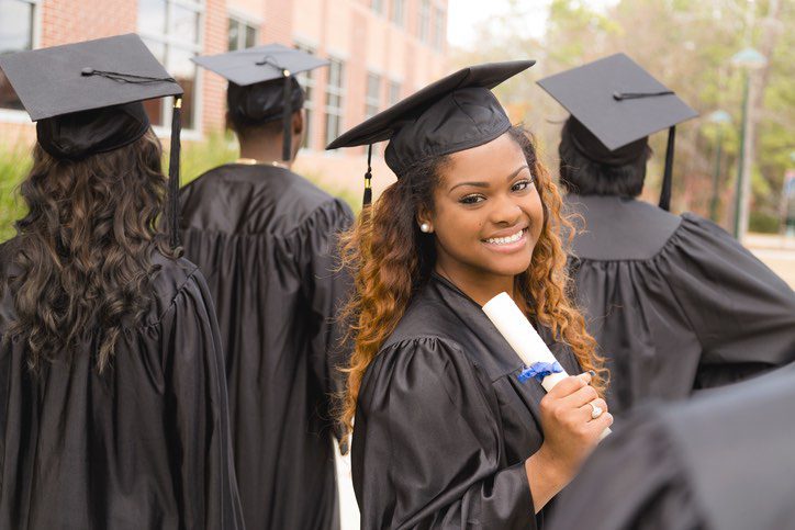 A graduated woman with a degree